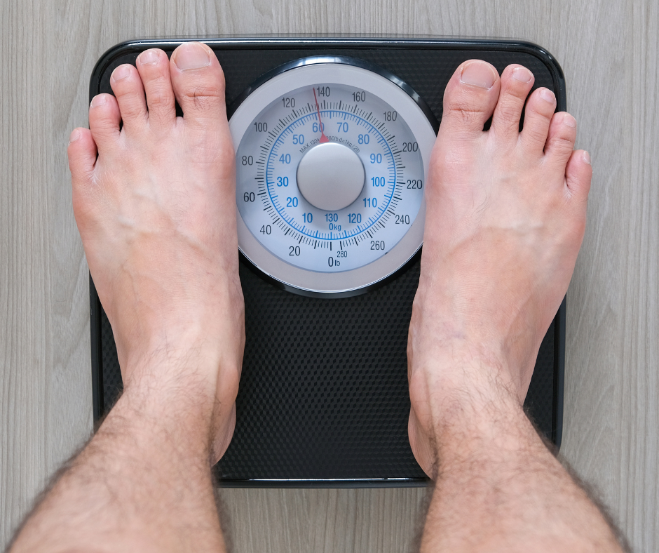 Foot on scale after weight loss