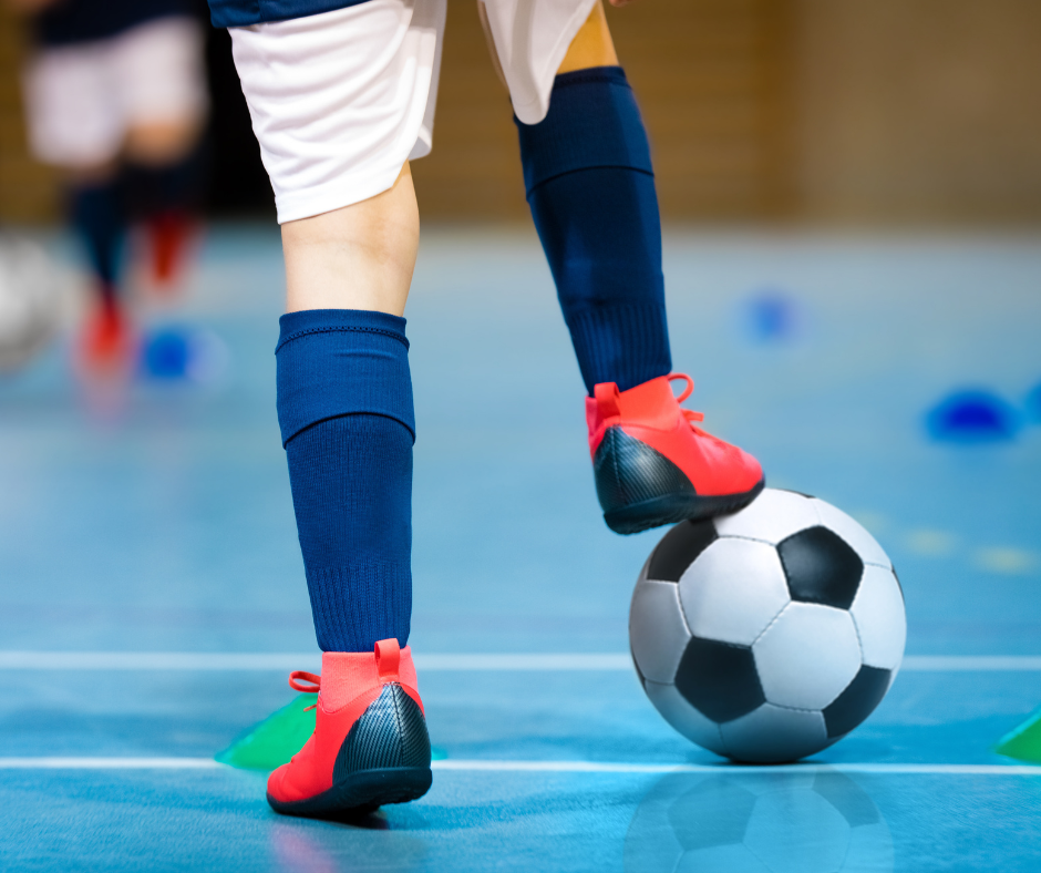 Child playing soccer